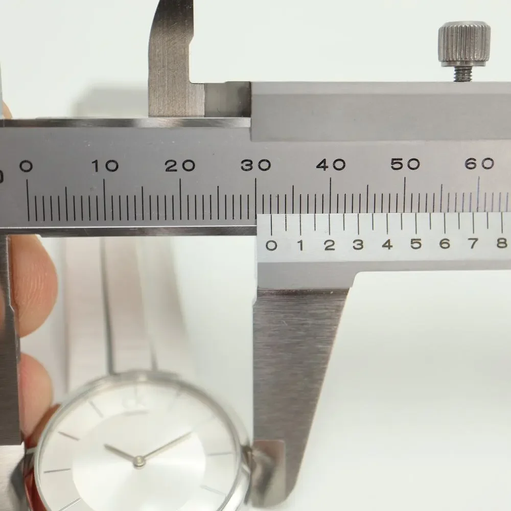 Calvin Klein Swiss Made Silver Tone 32mm Women Watch White Leather w New Battery